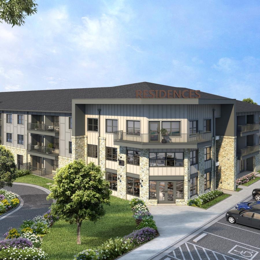 a building with cars parked in front